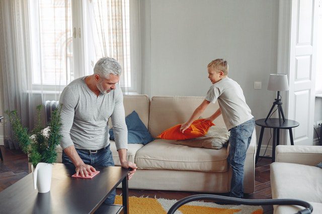 Man Cleaning Table